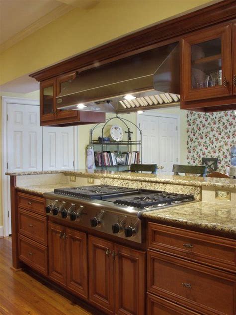 Their frameless cabinets are amazingly simple and functional combined with a modern look. Custom built cabinets with granite counter tops, breakfast ...