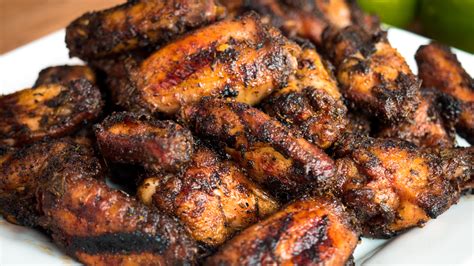 Clean the cooking grates well by brushing them and start grilling the chicken. Jamaican Jerk Chicken Wings - Grilled