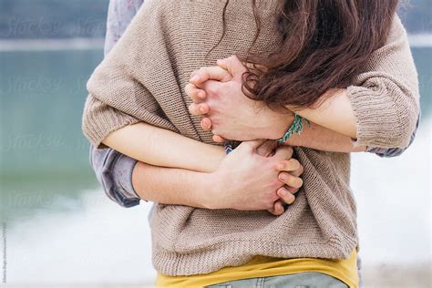 Boy Hugging His Girlfriend From Behind By Stocksy Contributor Studio