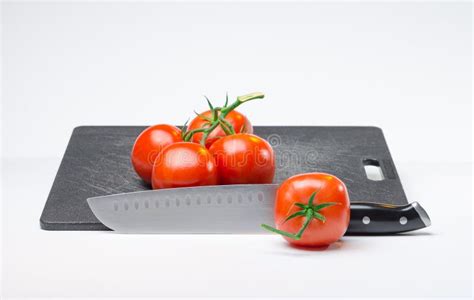 Tomatoes On Cutting Board Stock Photo Image Of Diet 59025164