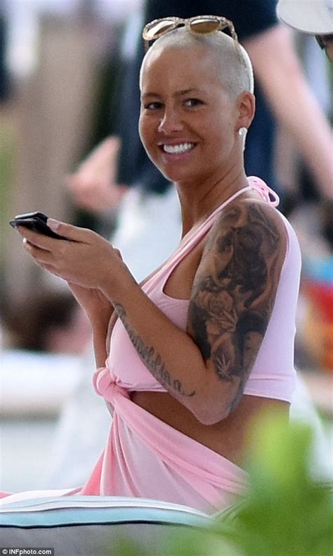 Amber Rose Flashes Cleavage During Miami Beach Getaway