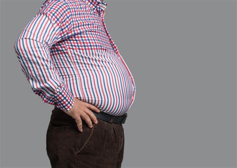 大肚腩女人暴饮暴食强迫性的妇女问题躯干美重的水平画幅腹腔摄影素材汇图网