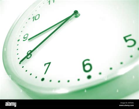 Modern Clock Face Tinged In Green Stock Photo Alamy