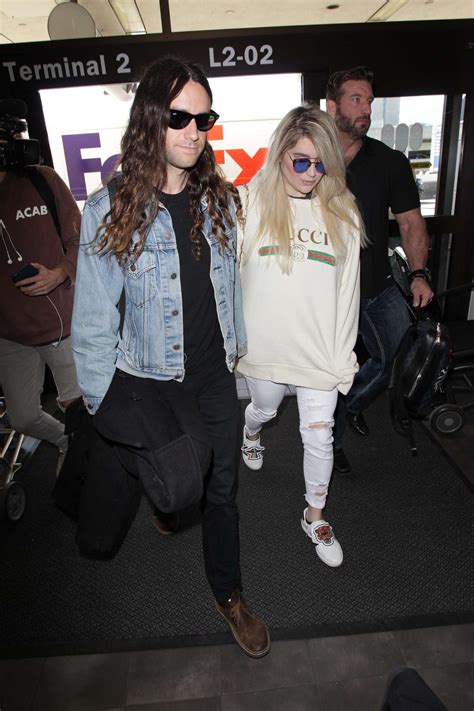 I had no interest in him anyway, just the gorgeous lyen that lay before me. Kesha with her boyfriend Brad Ashenfelter at LAX airport in LA