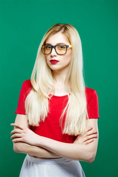 Blonde Girl With Long Hair And Eyeglasses Wearing White Skirt And Short