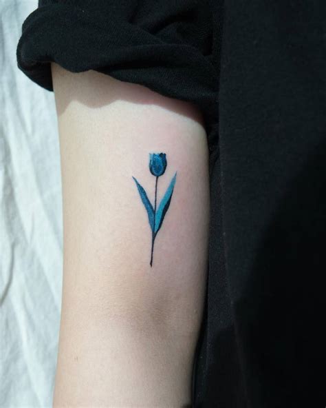 Blue Tulip Tattoo Located On The Bicep