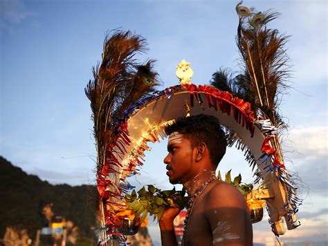 Thaipusam is a hindu festival that happens every january or february. ENGI's CONPAPER :: Thaipusam Festival: Hindu devotees with ...