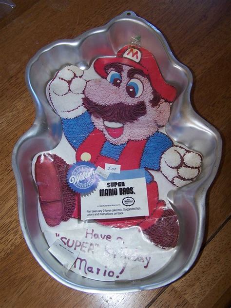 Cake represents the water, land and sky. Vintage Mario Cake Pan | Flickr - Photo Sharing!