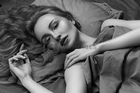 Beautiful Woman Sleeping While Lying In Bed With Comfort Sweet Dreams