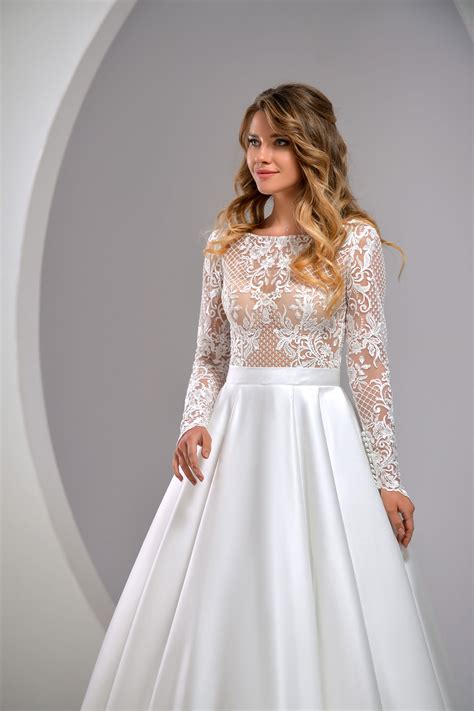 All of the illusion dresses in this collection are designed with chic styling in mind. Online Harper wedding dress - Stunning lace top style