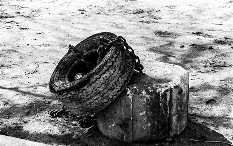 Chained Tire Photograph By Angus Hooper Iii Fine Art America