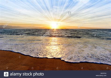Ocean Sunset Sun Rays Is A Brightly Lit Golden Orange