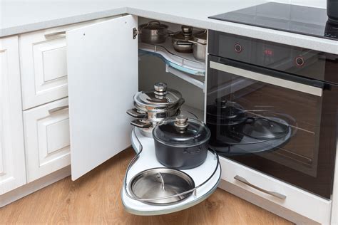 A popular upper corner kitchen cabinet idea is installing open shelving (or floating shelves). 3 Space Saving Corner Units For Modular Kitchen Design