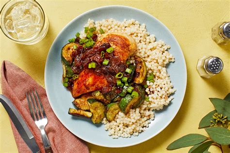 Remove from oven and carefully toss with roasted red peppers. Chicken with Cranberries and CousCous Recipe | HelloFresh ...