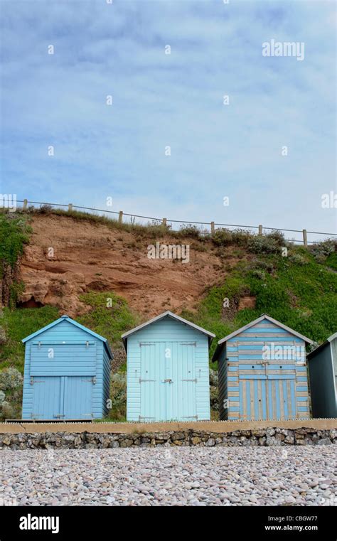 Colourful Wooden Beach Huts Along The Seafront At Budleigh Salterton Devon Stock Photo Alamy