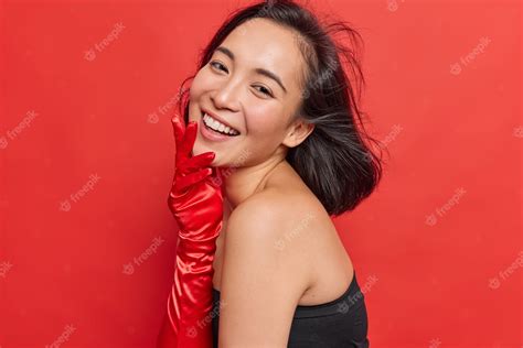 Free Photo Sideways Shot Of Happy Asian Woman With Dark Hair Floating