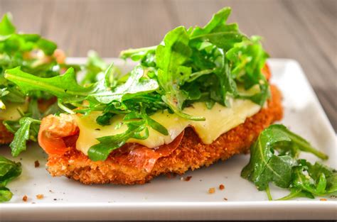The panko bread crumb chicken needs a relatively short time in the oven, not enough time for the breadcrumbs to become golden and crispy. Chicken Paillard with Brie, Prosciutto and Arugula - Never Not Hungry