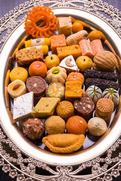 Premium Photo Mix Mithai Or Milk Made Sweets Of Indian And Pakistani