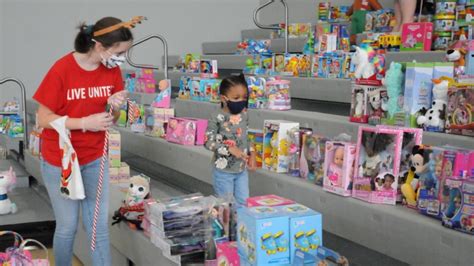 Hundreds of parish children receive free toys for Christmas  St