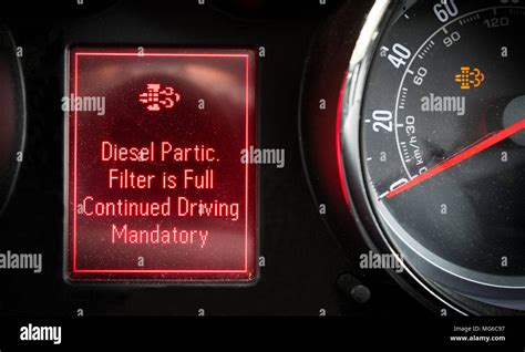 Diesel Particulate Filter Warning Light On A Car Dashboard Stock Photo