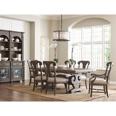 Formal dining room set includes expandable rectangular table and chairs, double pedestal base with detailed carvings in a warm medium cherry finish, two 15 inch leaves to expand table top from 66 to 96 long, smooth rounded corners and an intricately carved trim. Kincaid Furniture Greyson Formal Dining Room Group ...