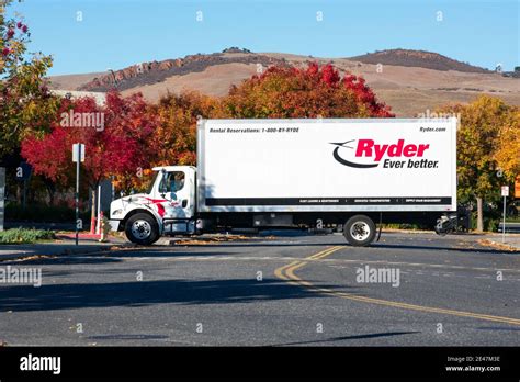 Ryder truck crossing the street. Ryder System, Inc. is an American