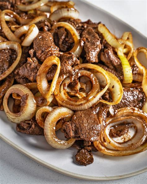 Best Bistek Recipe The Saucy Tender Filipino Beefsteak Easy Filipino