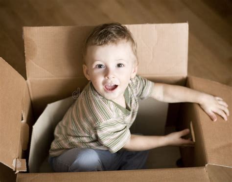 Portrait Of Cute Little Boy In Carton Box Stock Photo Image Of House