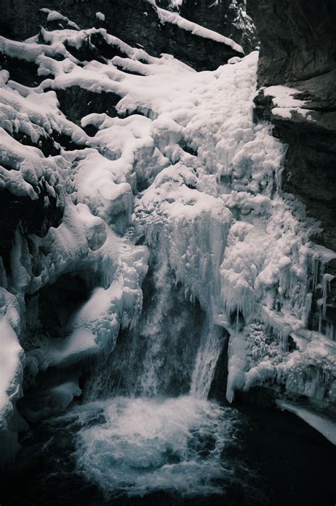 Free Images Nature Rock Waterfall Snow Winter Black And White