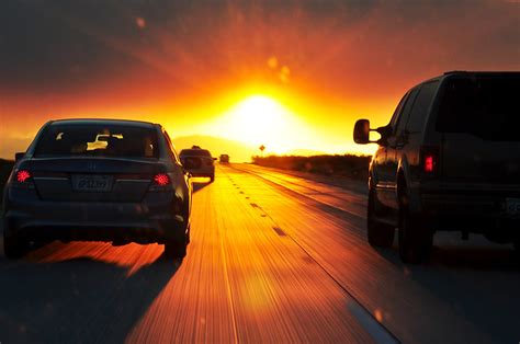 A lone car driving into the sunset on highway 64 in nw oklahoma. Driving into the sunset | Flickr - Photo Sharing!