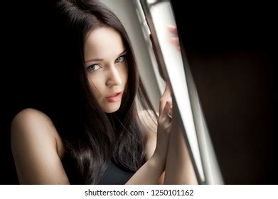 Beautiful Sexy Brunette Girl Posing On Stock Photo