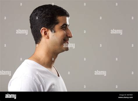 Side Profile Of A Young Man Smiling Stock Photo Alamy
