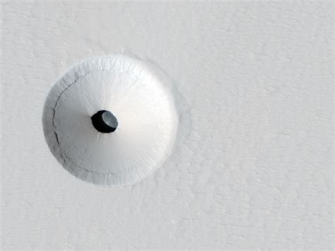 Apod 2014 March 9 A Hole In Mars