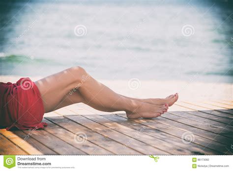 Woman S Beautiful Legs On The Beach Stock Photo Image Of Slim Person