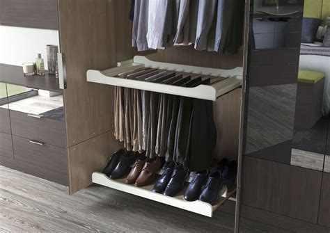 The storage solutions behind your beautifully custom made bedroom doors. Trouser rails and shoe racks are just another storage ...