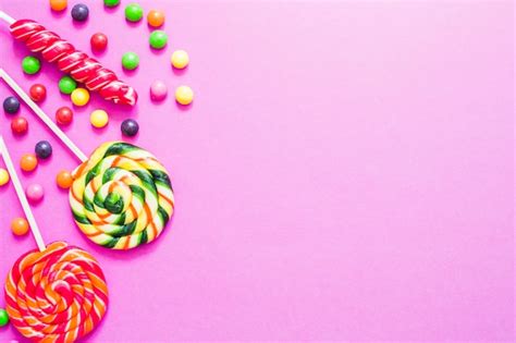 Different Sweet Candies On Pink Background Photo Free Download