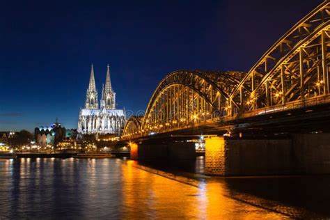 Cologne Skyline With Cologne Cathedral And Hohenzollern Bridge At Night