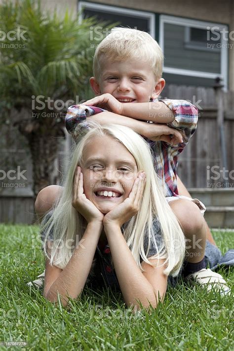 Brother And Sister Outside Stock Photo - Download Image Now - iStock
