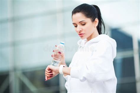 Fitness Sport And Healthy Lifestyle Concept Woman Drinking Water
