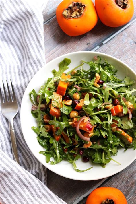 Persimmon And Pomegranate Salad With Arugula And Hazelnuts Joanne