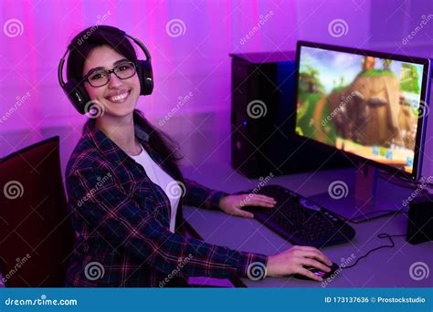 Gamer Girl At Pc Smiling To Camera Sitting At Home Stock Photo Image