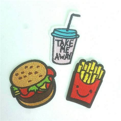 two embroidered patches one with a drink and the other with a hamburger and fries