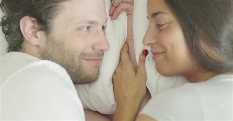 couple kissing in bed stock video envato elements