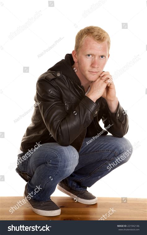 Man Kneeling Down Low His Leather Stock Photo 221942146 Shutterstock