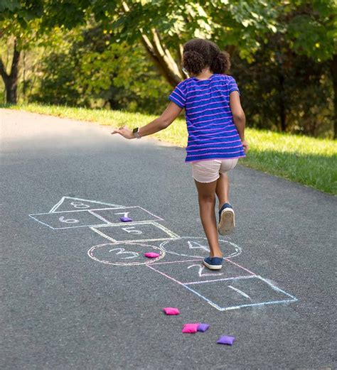 These Playground Games Are Classics For A Reason Kickball Hopscotch