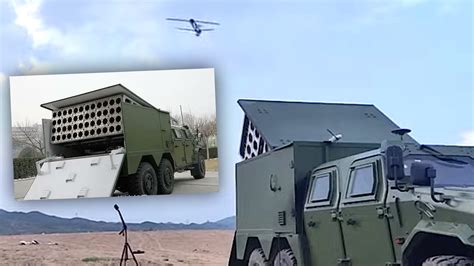 [b ] china conducts test of massive suicide drone swarm launched from a box on a truck