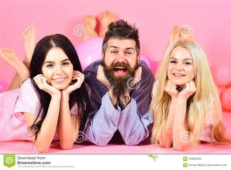 Cheerful Morning Concept Threesome Relaxing In Morning Stock Image