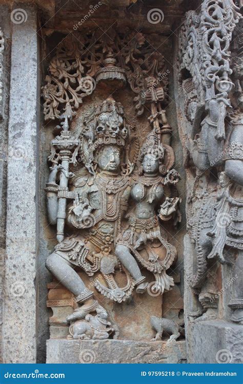 Hoysaleshwara Temple Wall Carving Of Lord Shiva And Parvati God And