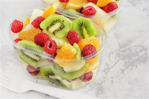 Fresh Sliced Tropical Fruits In Plastic Container Stock Photo Image