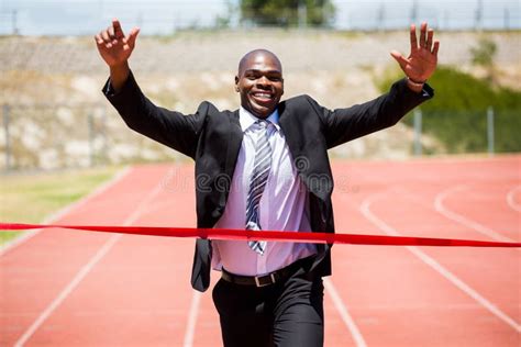 Successful Businessman Crossing The Finishing Line Stock Image Image